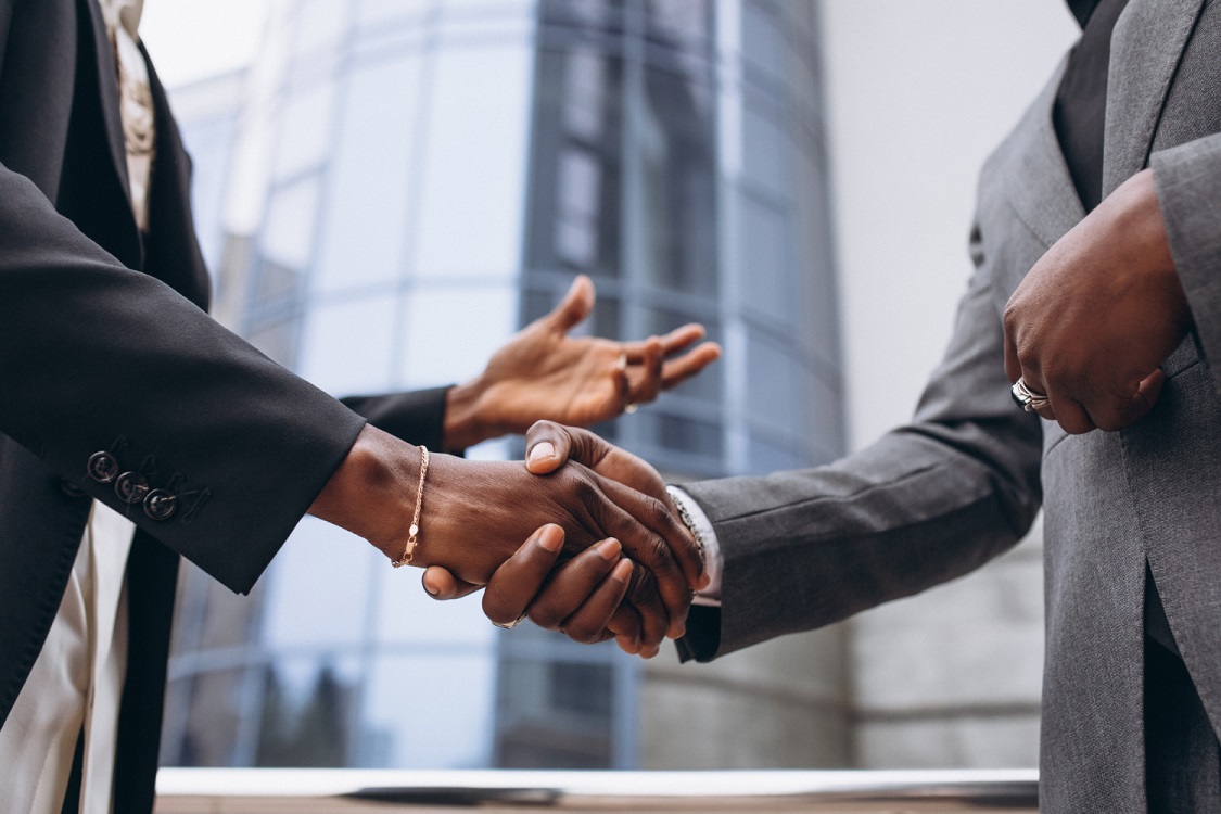 Two people shaking hands